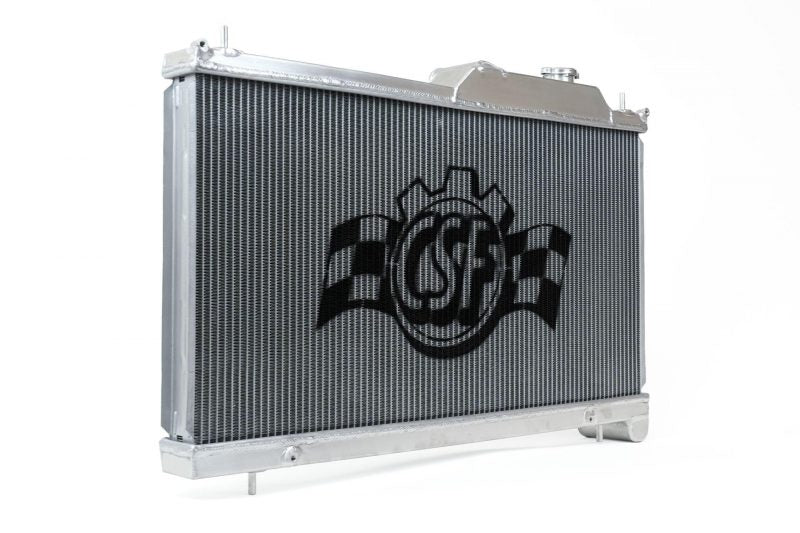 High-performance aluminum 2-row radiator for Legacy, featuring a sleek design and CSF logo for enhanced cooling efficiency.
