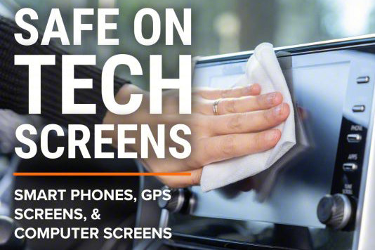 Hand cleaning a car's touch screen with text about safe use on various screens.