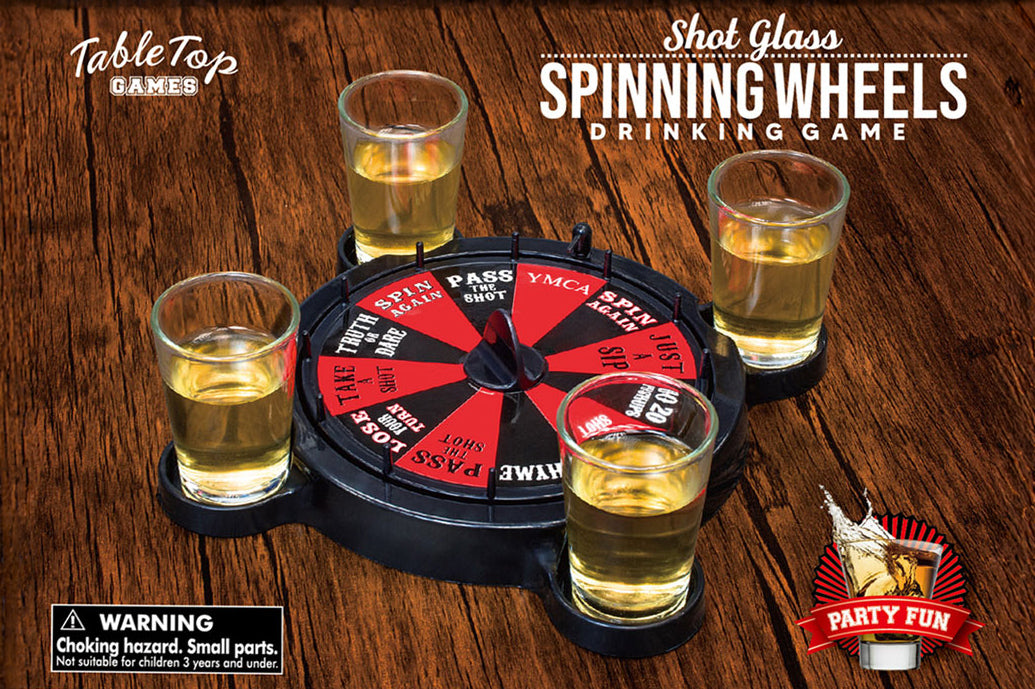 Spinning wheel drinking game with shot glasses on a wooden surface, featuring TableTop Games branding.