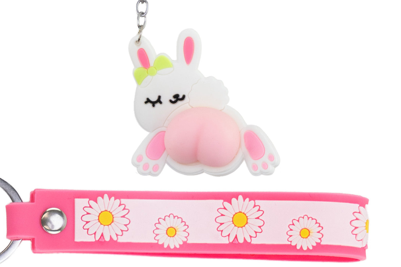 Keychain with a cartoon bunny character and floral design on a white background