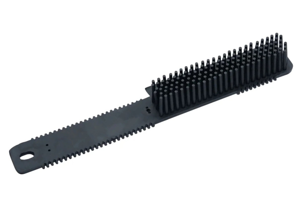 Black brush with bristle head and handle on a white background