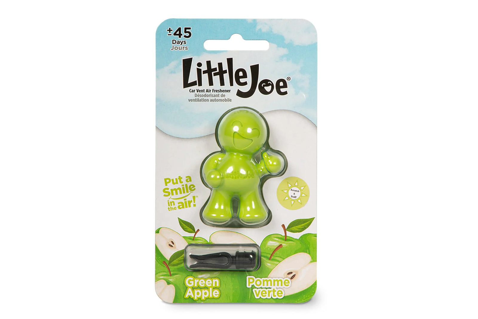 Green apple scented car air freshener in packaging on white background.