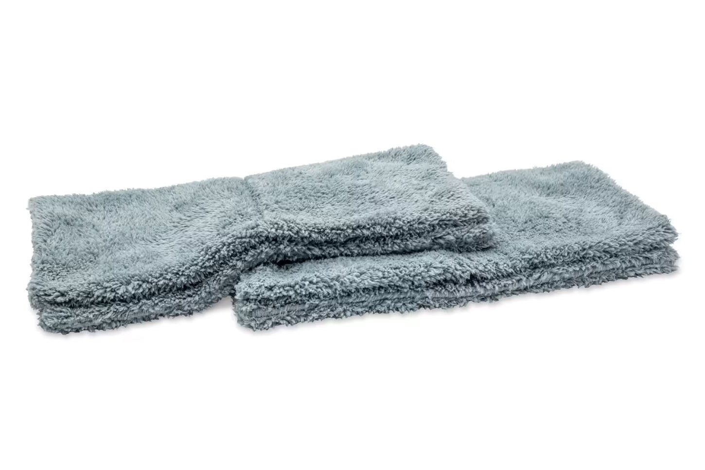 Two blue microfiber cloths on a white background