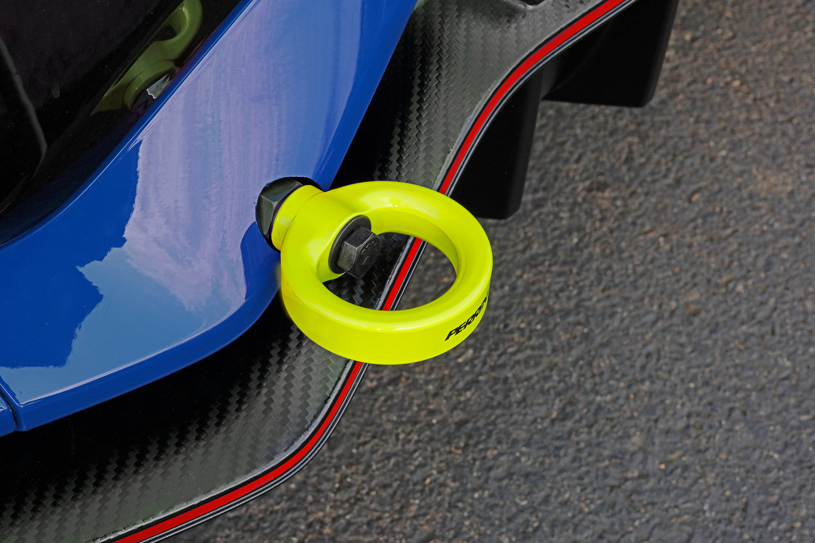 Bright yellow rear tow hook designed for 2017-2021 Civic SI and Civic Type R hatchbacks, enhancing performance and style.