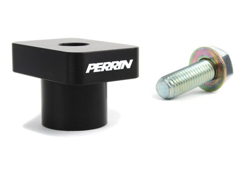 Perrin transmission mount support for manual vehicles, featuring a black aluminum design and included bolt.