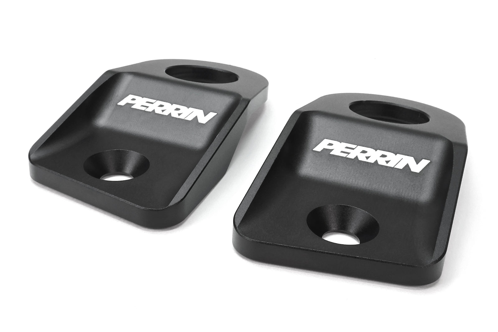 Perrin radiator stays for 2015-2021 WRX, STI, Impreza, and Crosstrek, featuring a durable black finish.