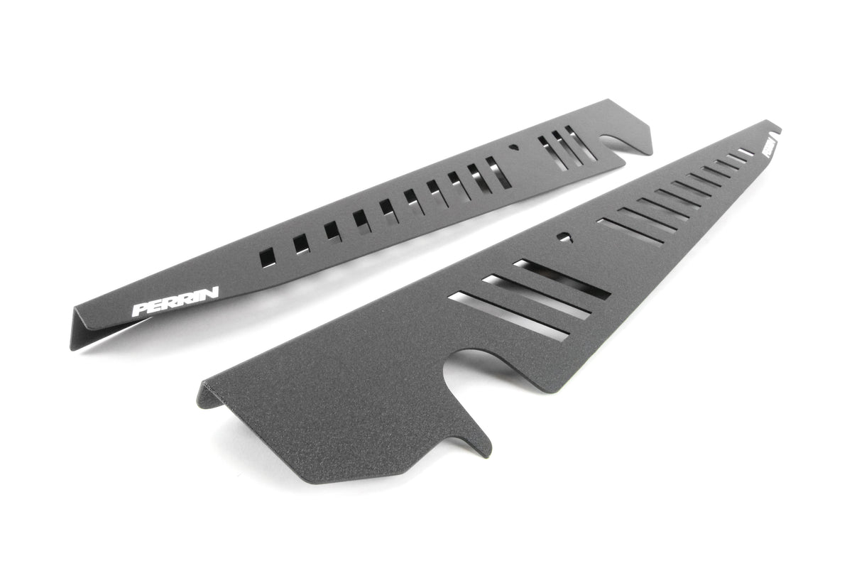 Fender shrouds for 2015-2021 WRX/STI, designed for improved airflow and engine aesthetics. Durable black finish.