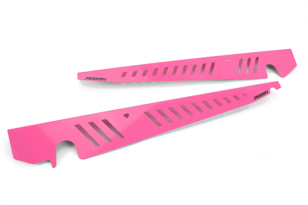 Fender shrouds in vibrant pink for 2015-2021 WRX/STI, designed for enhanced style and performance.