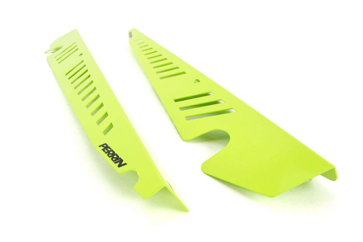 Fender shrouds for 2015-2021 WRX/STI in vibrant green, designed for enhanced performance and style.