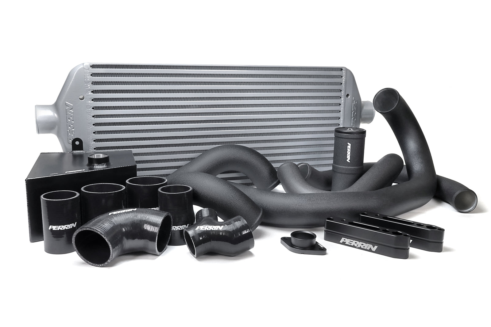 Front mount intercooler kit for 2015-2021 WRX featuring aluminum core, silicone hoses, and mounting hardware.