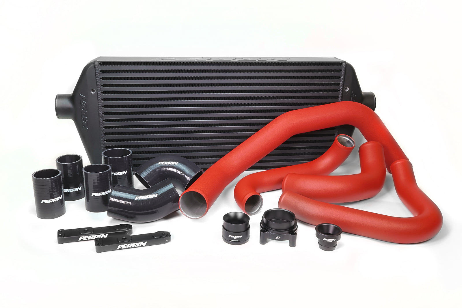 Front mount intercooler kit for 2022-2025 WRX, featuring red and black hoses, clamps, and a large intercooler.