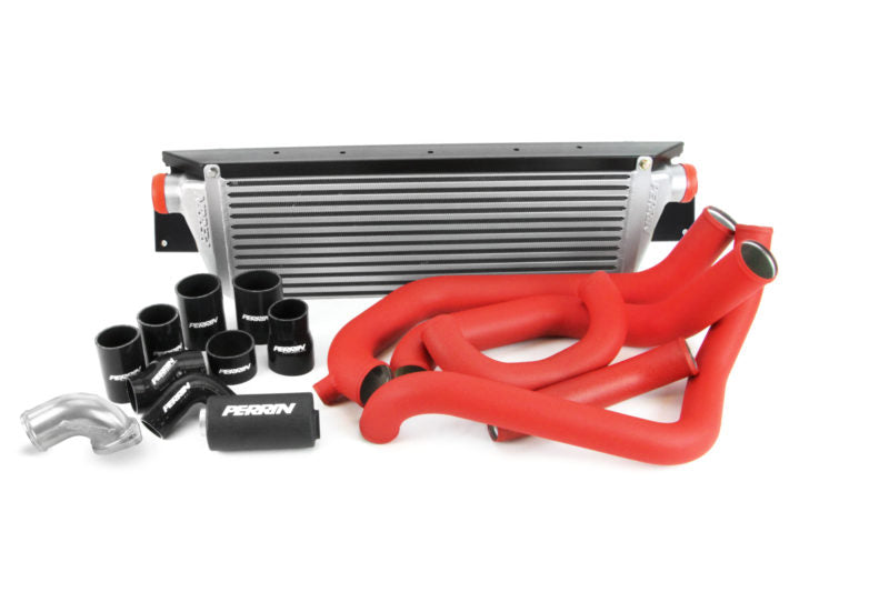 Front mount intercooler kit for 2008-2014 WRX, featuring a large intercooler and red silicone hoses.