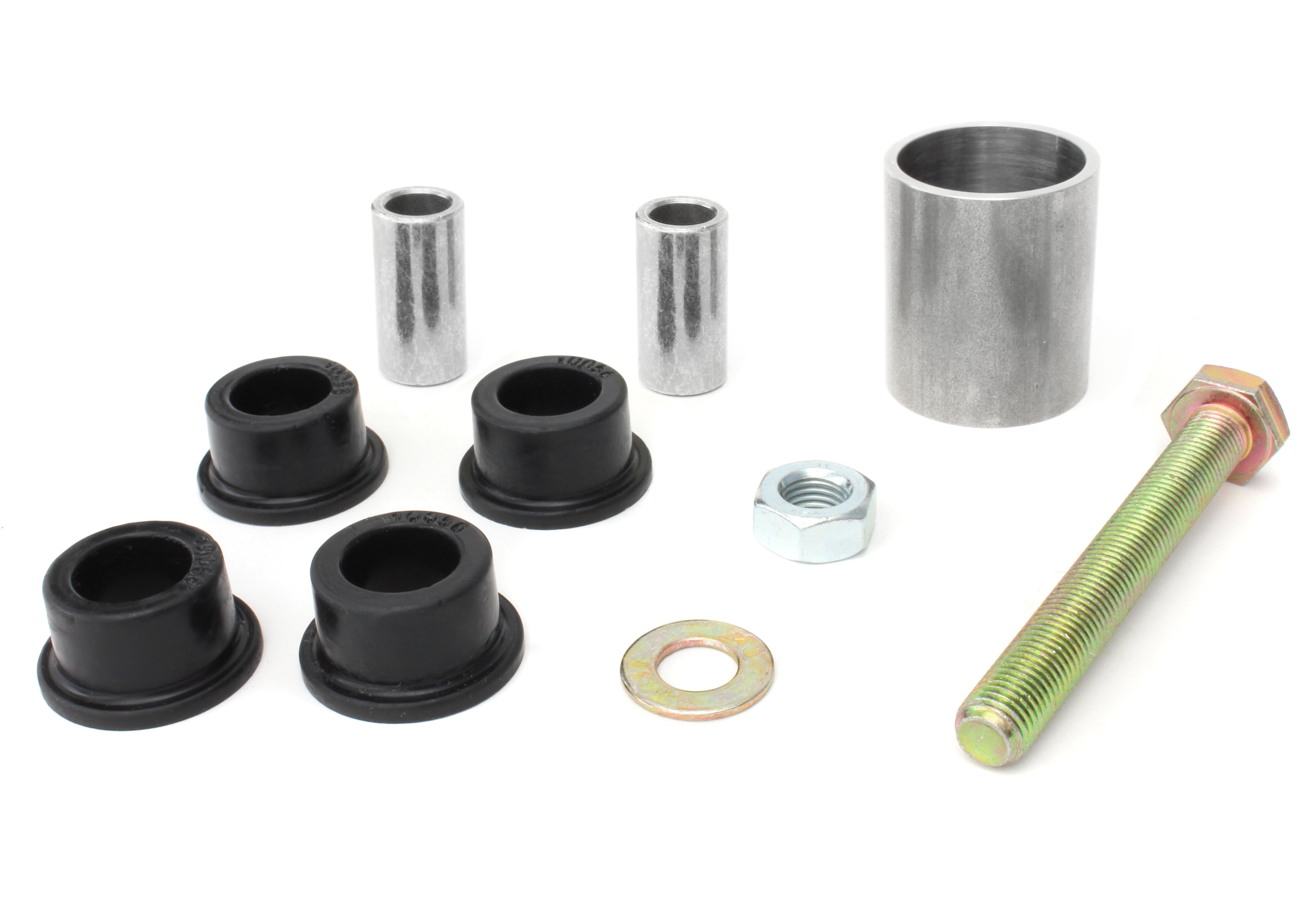 PERRIN Steering Rack Lockdown kit components on white background, four black polyurethane bushings and two aluminum sleeves