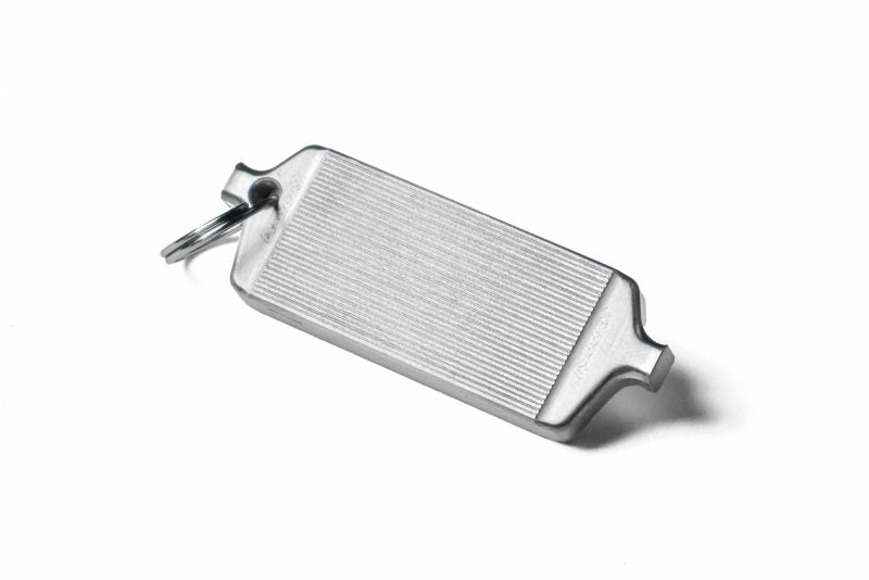 Keychain featuring a mini front mount intercooler design, made of silver metal with a textured surface.