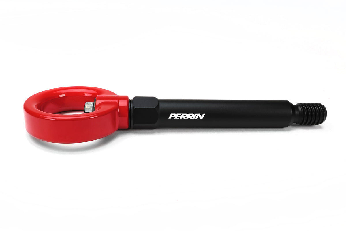 Close-up view of PERRIN rear tow hook for GR Corolla displaying precision fitment and red anodized finish.