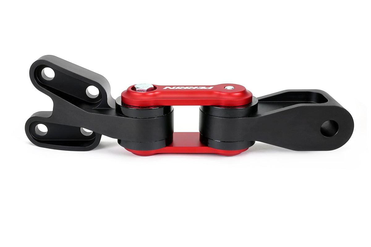 PERRIN Pitch Stop Mount for GR Corolla side profile in black and red, showing bushings and mounting holes.