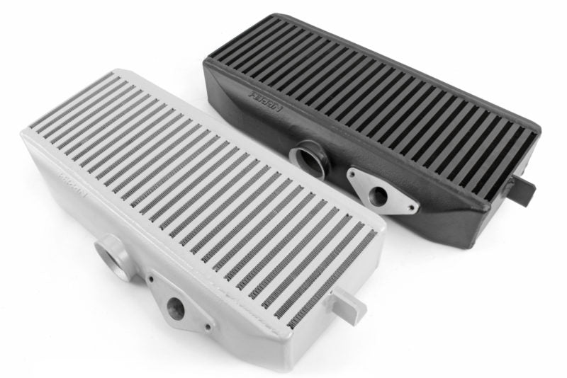 Top mount intercooler for 2008-2021 Subaru STI, featuring a sleek design with horizontal fins and dual inlet/outlet ports.