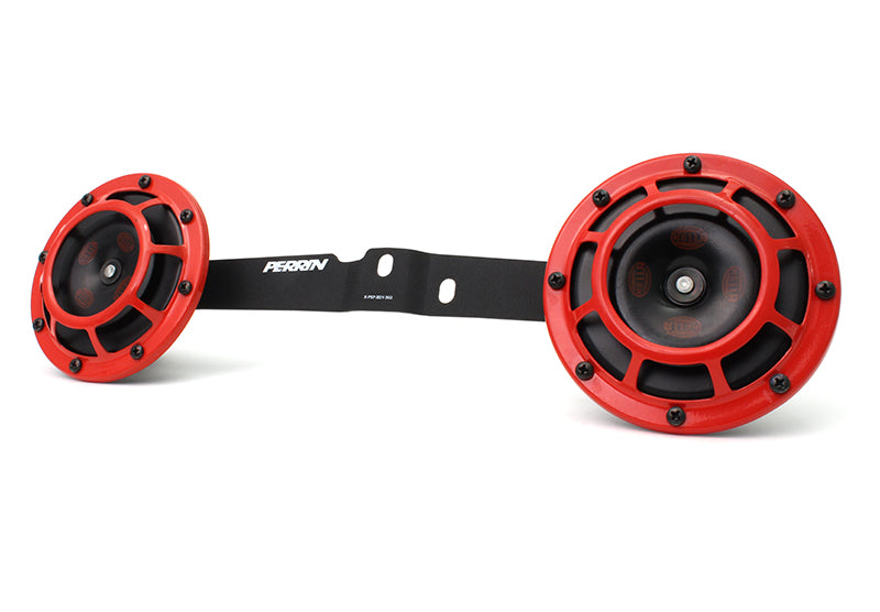 Horn bracket for 2008-2014 WRX, STI, and Impreza featuring dual red horns and a sturdy black mounting plate.