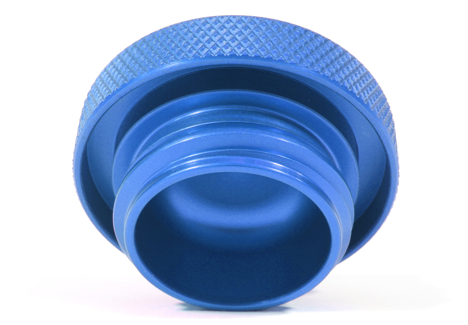 Blue anodized oil fill cap with a textured grip for easy handling, designed for performance automotive applications.