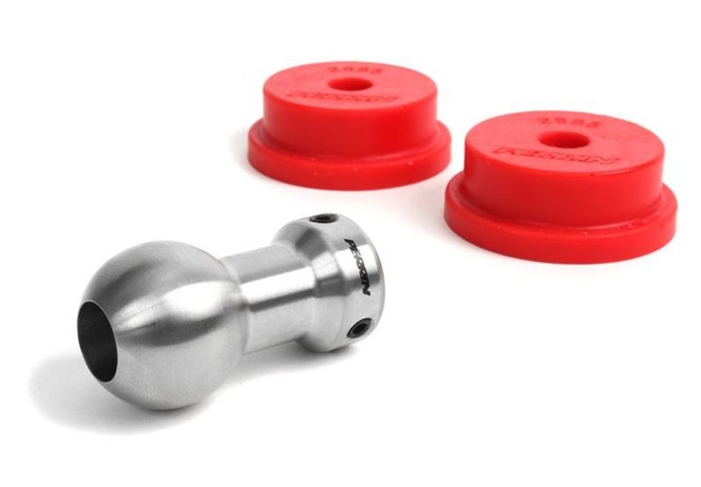 Short shifter for STI with a polished metal ball and two red bushings, designed for improved gear shifting performance.