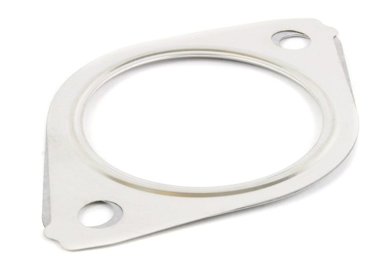 Front pipe gasket made of metal with a circular shape and two mounting holes for secure installation.