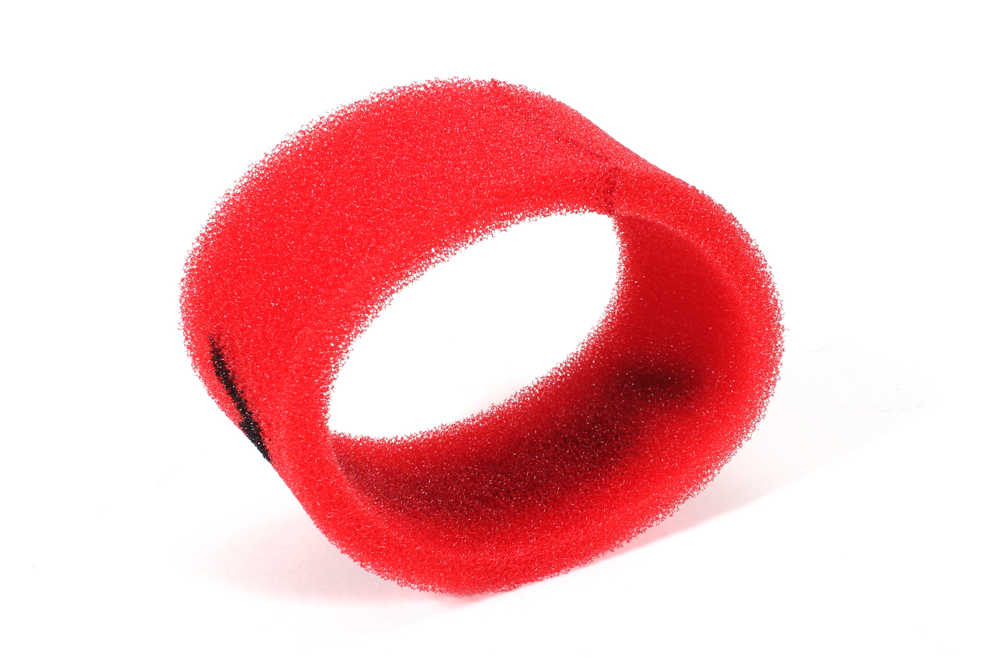 Red foam brake reservoir cover designed for enhanced protection and style in performance vehicles.