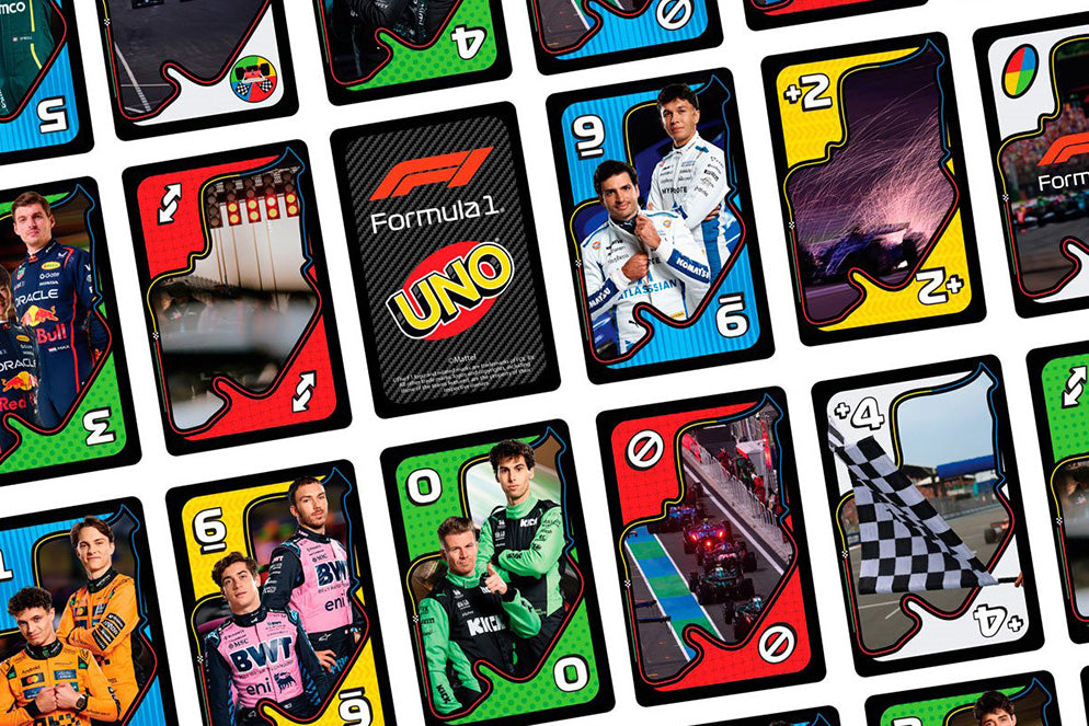 Collection of Formula 1 themed playing cards with various designs and branding.