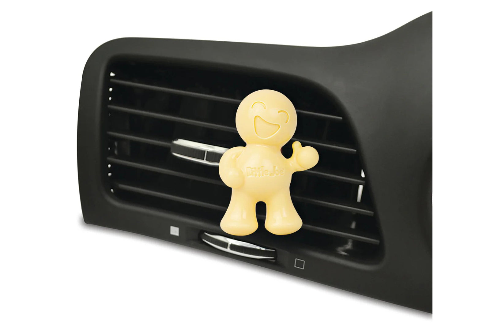 Car air freshener shaped like a cartoon character on a black car vent.