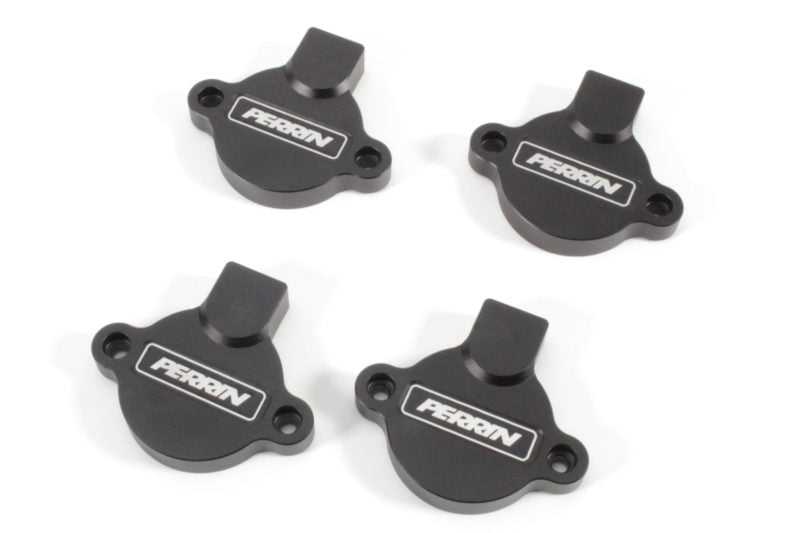 Set of four black Cam Solenoid Covers for WRX, featuring the Perrin logo and a sleek design for engine enhancement.
