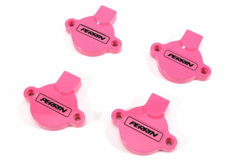 Perrin pink cam solenoid covers for WRX, featuring a sleek design and logo, enhancing engine aesthetics.