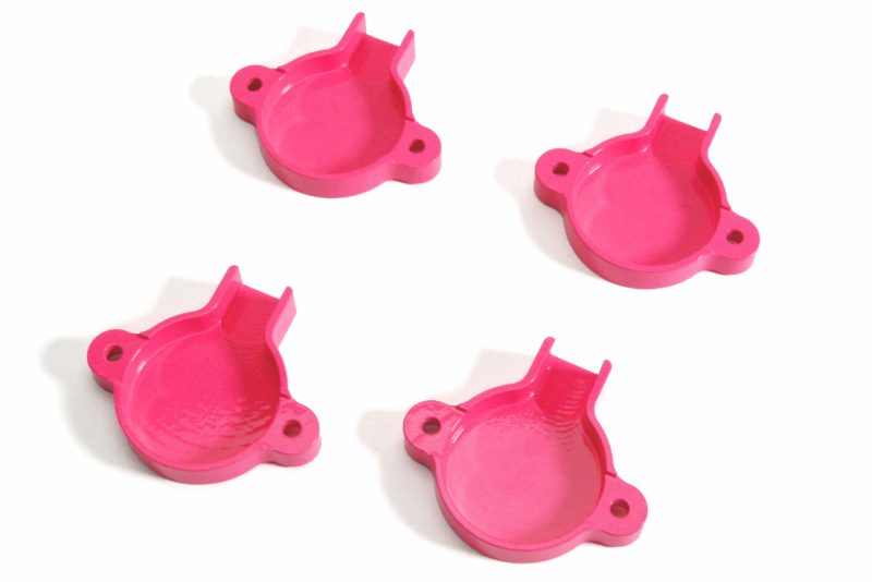 Bright pink cam solenoid covers for WRX, designed for engine protection and enhanced aesthetics. Set of four pieces.
