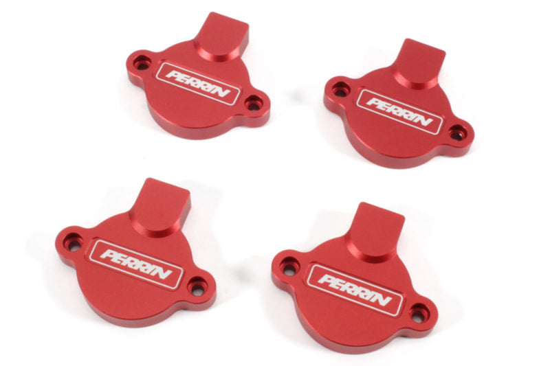 Red aluminum cam solenoid covers for WRX, featuring the Perrin logo, designed for engine performance enhancement.