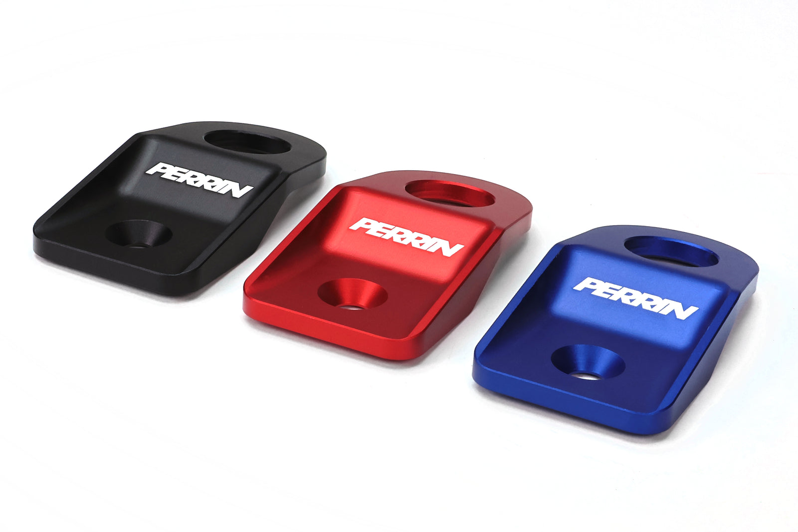 PERRIN radiator stays in black, red, and blue for 2008-2014 WRX, STI, Impreza, and Outback vehicles.