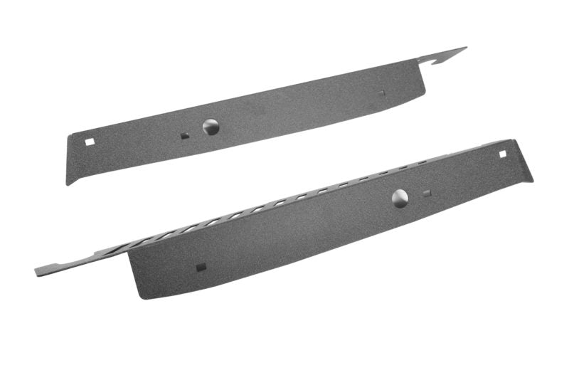 Fender shrouds in a sleek black finish, designed for automotive applications, featuring precise cutouts and slots.