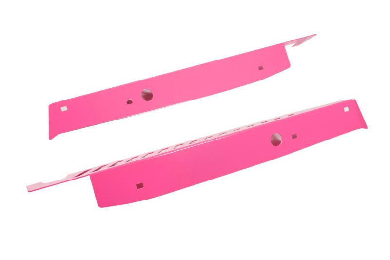 Bright pink Fender shrouds designed for enhanced durability and style in motorcycle applications.