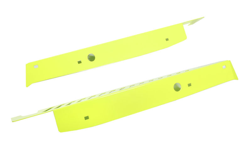 Bright yellow Fender shrouds designed for enhanced protection and styling in off-road vehicles.