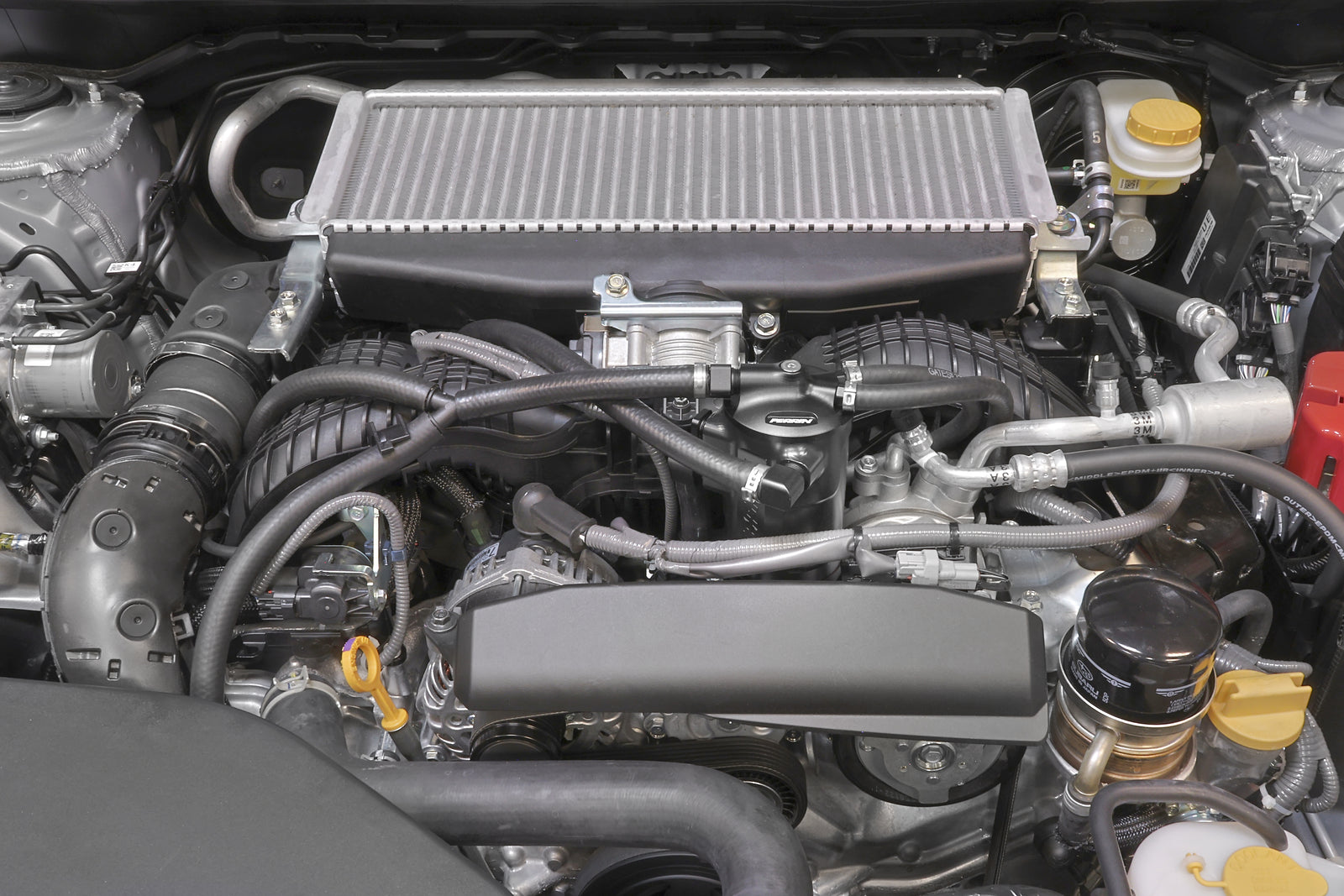 PERRIN black Air Oil Separator installed in 2022-2025 Subaru WRX engine bay.