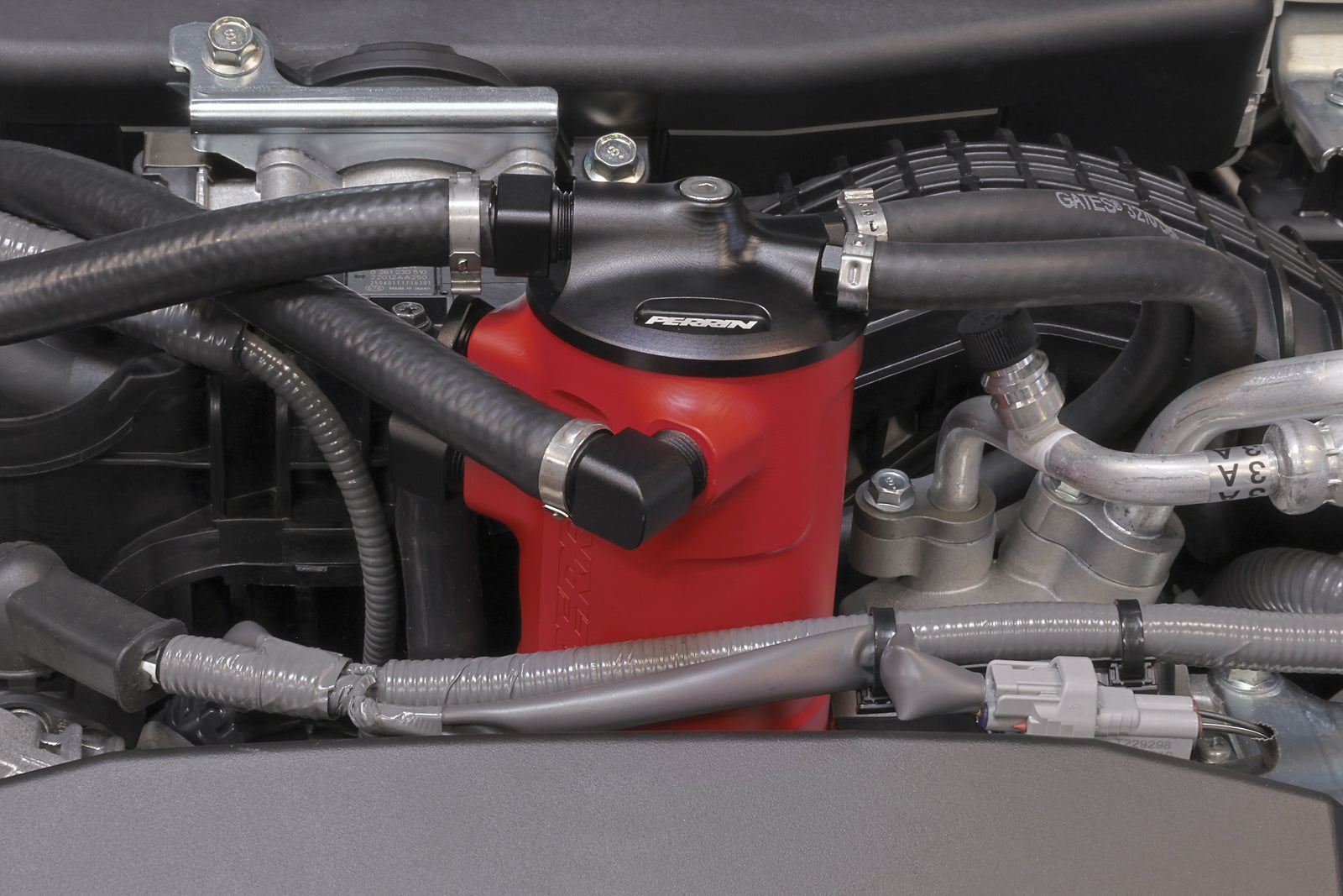 PERRIN red Air Oil Separator installed in 2022-2025 Subaru WRX engine bay.