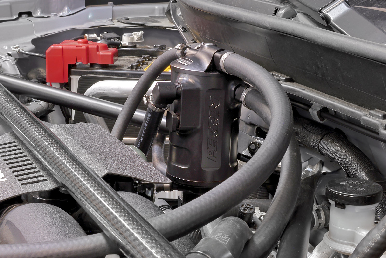 PERRIN black Air Oil Separator installed in 2013-2025 BRZ/FR-S/86 engine bay.
