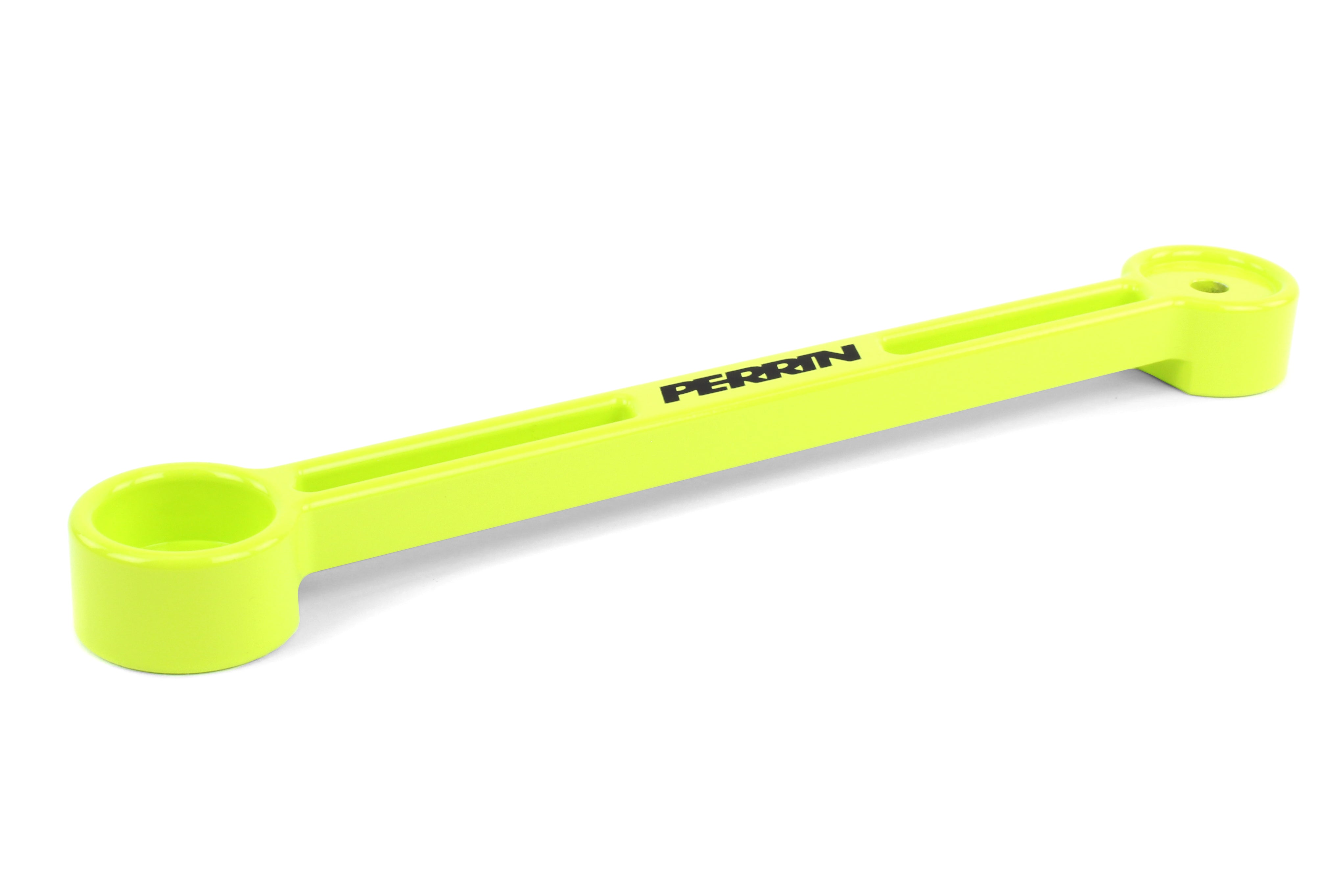 Perrin battery tie down in bright yellow, designed for securing batteries in performance vehicles.