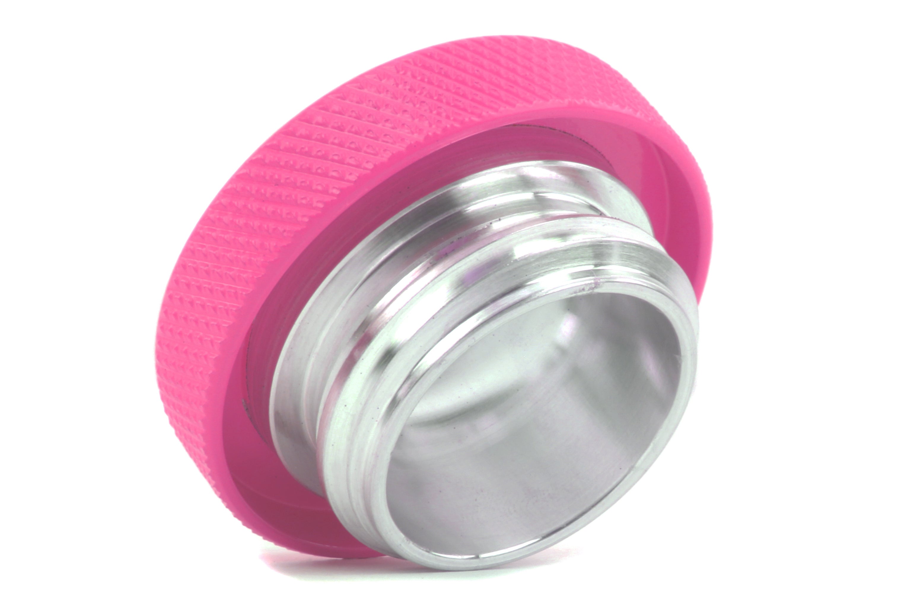 Pink oil fill cap designed for performance vehicles, featuring a textured grip and durable aluminum construction.