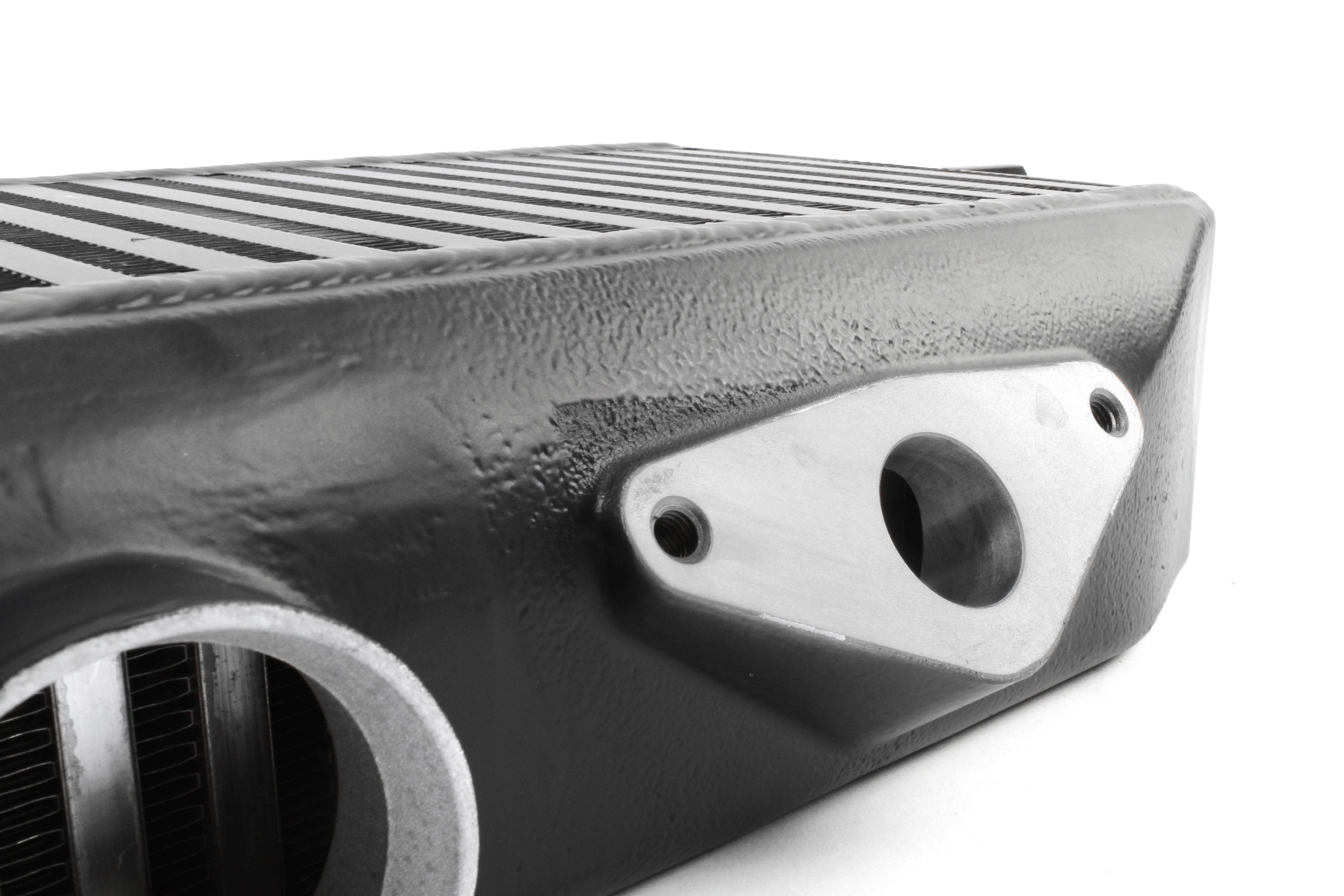 Top mount intercooler designed for 2008-2021 Subaru STI, enhancing engine performance and cooling efficiency.
