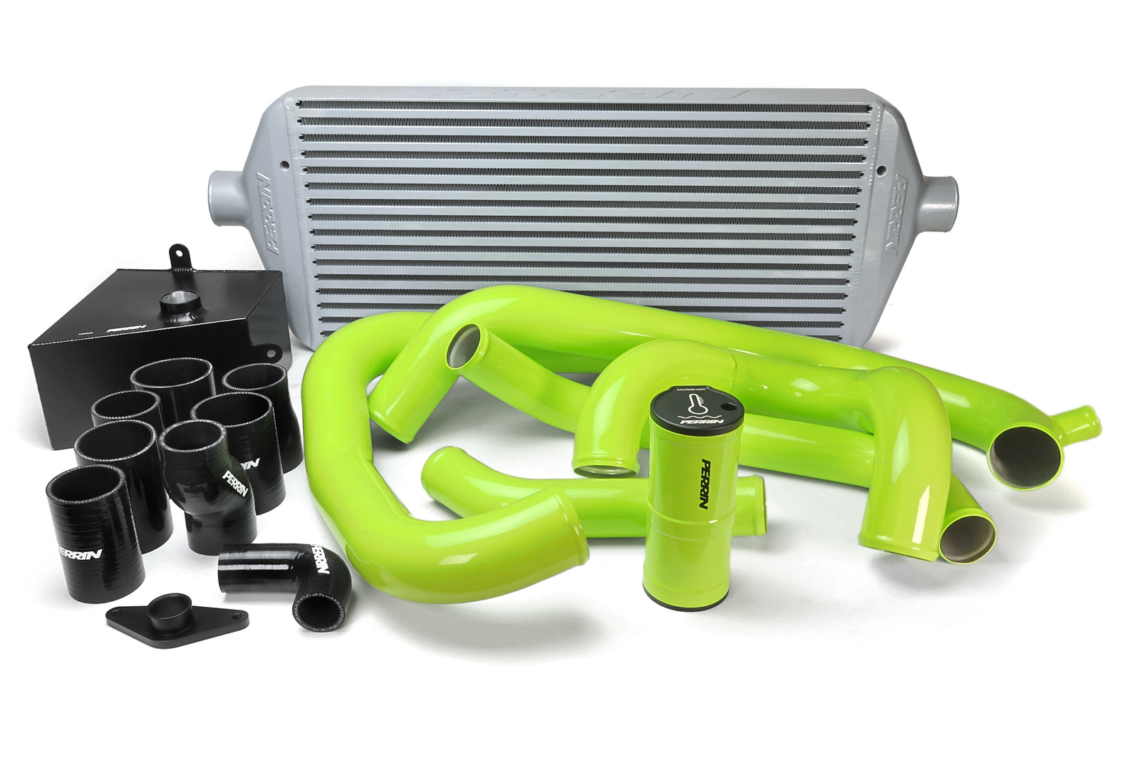 PERRIN Front Mount Intercooler Kit with large silver core and neon yellow piping for 2015-2021 STI.