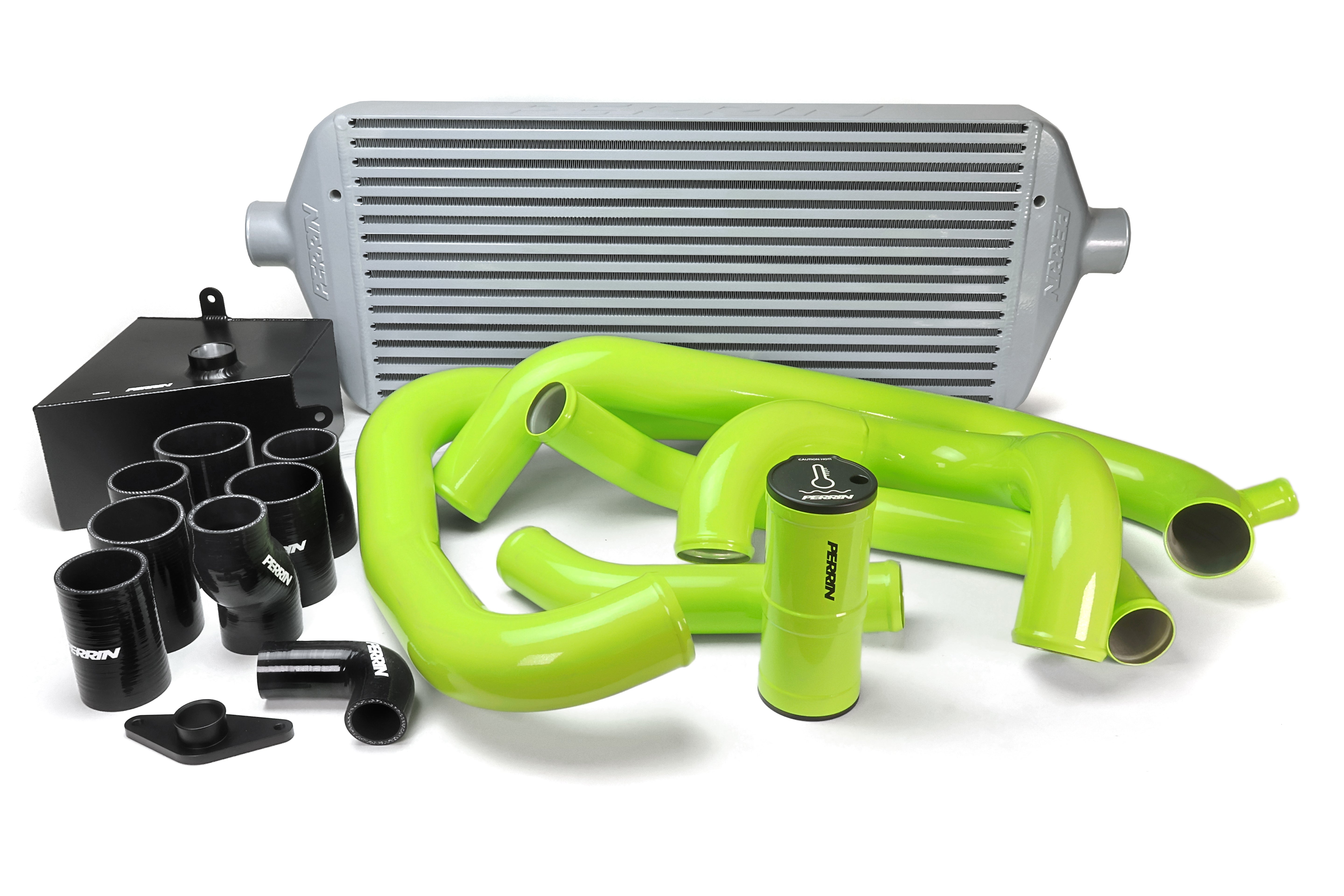 PERRIN Front Mount Intercooler Kit with large silver core and neon yellow piping for 2015-2021 STI.