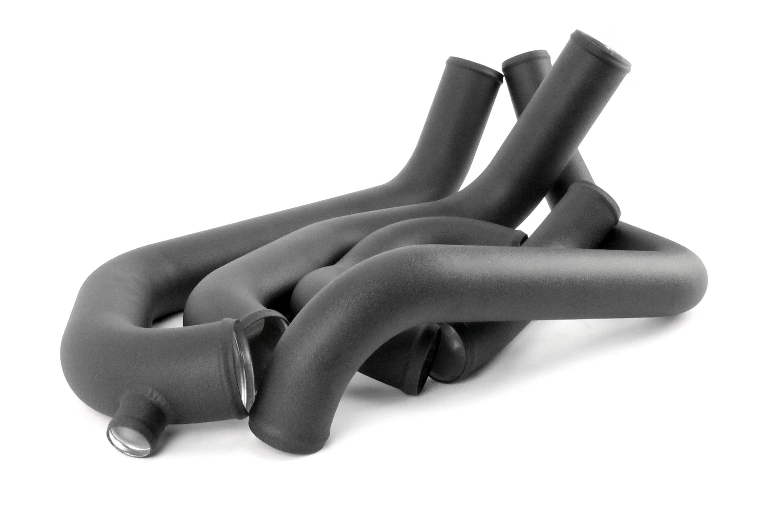 Front mount intercooler kit components for 2008-2014 WRX, featuring multiple black piping sections for enhanced airflow.