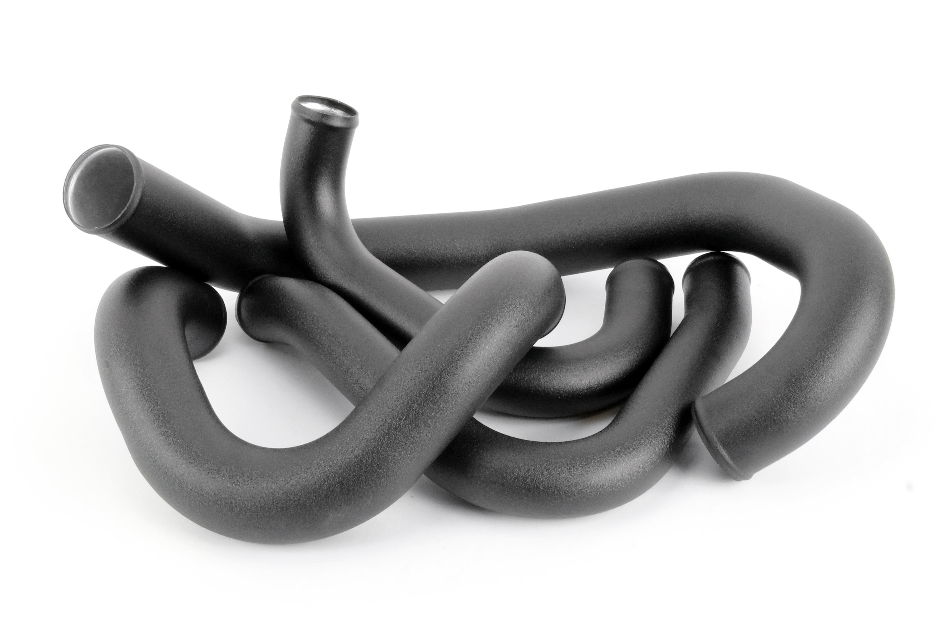 Front mount intercooler kit hoses for 2015-2021 WRX, featuring a sleek black design and durable construction.