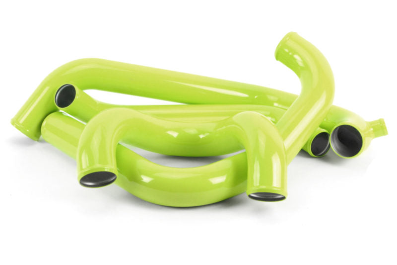 Bright green silicone hoses for a front mount intercooler kit designed for 2015-2021 Subaru STI models.