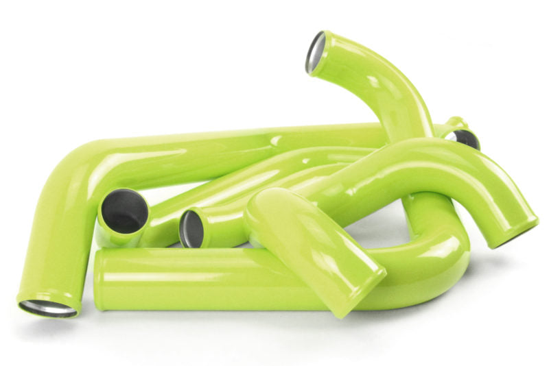 Bright green silicone hoses for a front mount intercooler kit designed for 2015-2021 Subaru STI models.