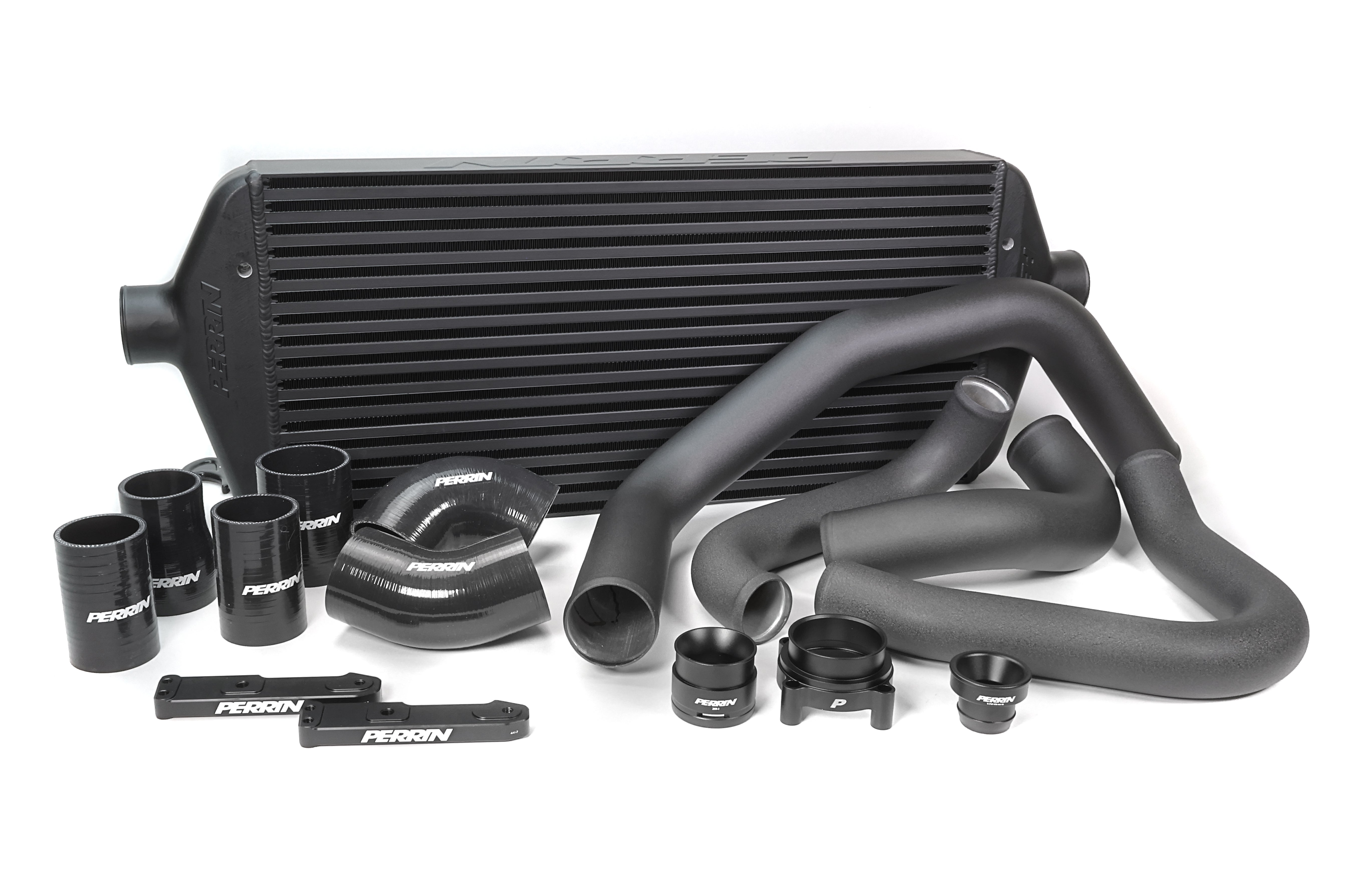 Front mount intercooler kit for 2022-2025 WRX, featuring pipes, couplers, and mounting hardware for enhanced performance.