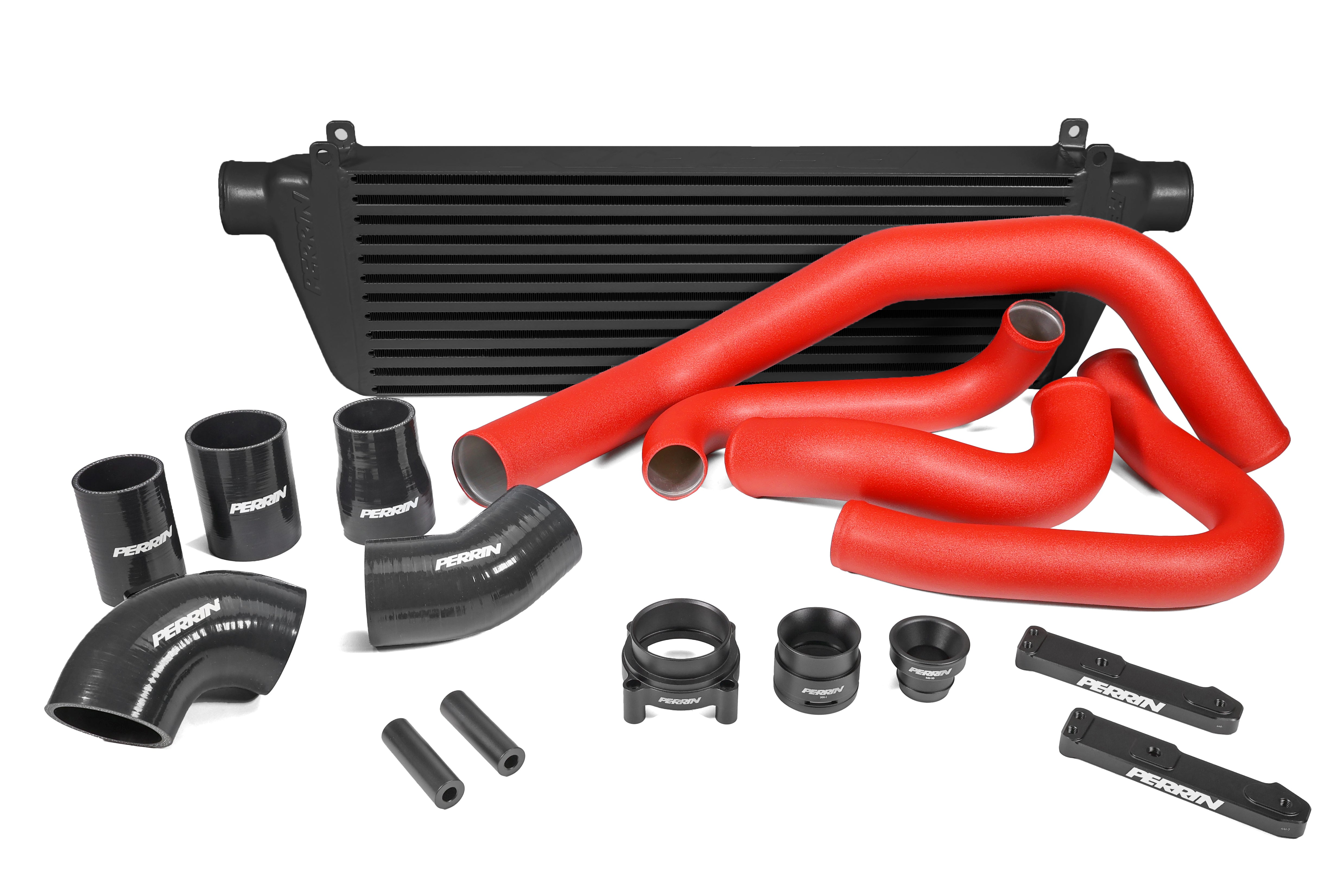 Front mount intercooler kit for 2022-2025 WRX featuring black intercooler, red silicone hoses, and installation components.